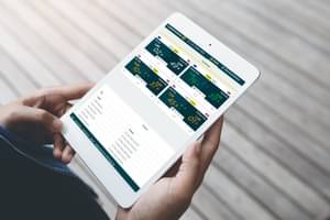 Tablet closeup viewing FX Live Trader Web