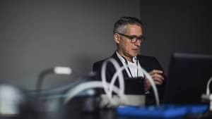 Male IT professional working in creative office