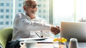 Picture of two business man discussing business and seem like an agreement is made.